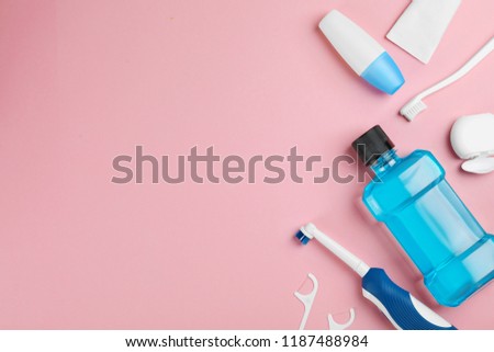 Flat lay composition with oral care products and space for text on color background. Teeth hygiene