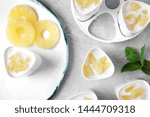 Flat lay composition with pineapple yogurt and ingredients on table. Multi cooker recipe