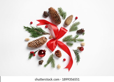 Flat lay composition with pinecones on white background