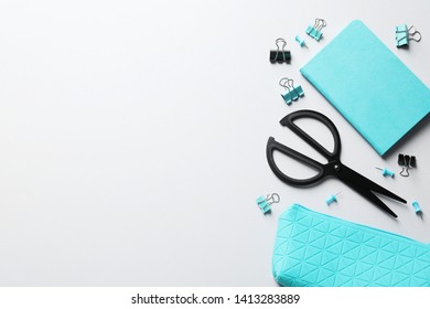 Flat lay composition with scissors on grey background. Space for text