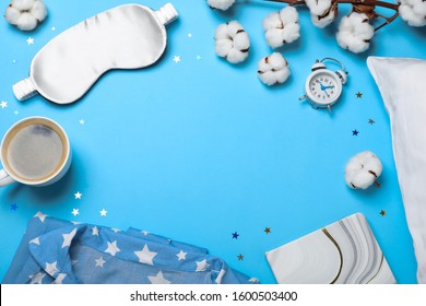 Flat Lay Composition With Sleeping Mask On Light Blue Background, Space For Text. Bedtime Accessories