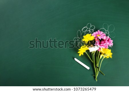 Flat lay composition for Teacher's day on chalkboard