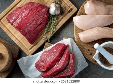 flat lay composition of various meat on black table, top view