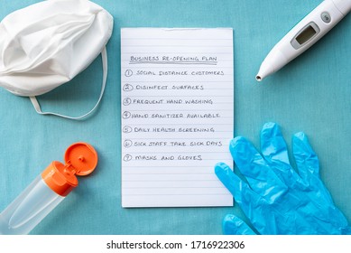 Flat Lay Concept Shot With Business Plan For Re-opening A Business After COVID-19 Coronavirus Closure