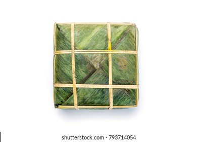 Flat Lay Cooked square glutinous rice cake / Chung cake .
Vietnamese new year food