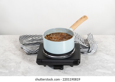 Flat Lay. Cooking Boba Pearls In A Cooking Pot To Prepare Mango Boba Smoothie.