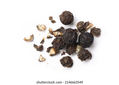 Flat lay of cracked black peppercorns (black pepper) isolated on white background. - Powered by Shutterstock