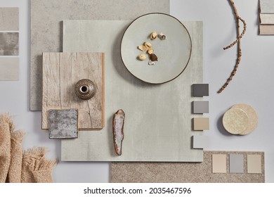 Flat lay of creative architect moodboard composition with samples of building, textile and natural materials and personal accessories. Top view, white background, template.
