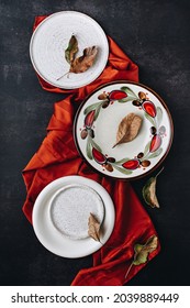 Flat lay creative concept of fallen autumn leaves and red apples on a red saten against dark background. Season concept. Happy Thanksgiving idea. - Shutterstock ID 2039889449