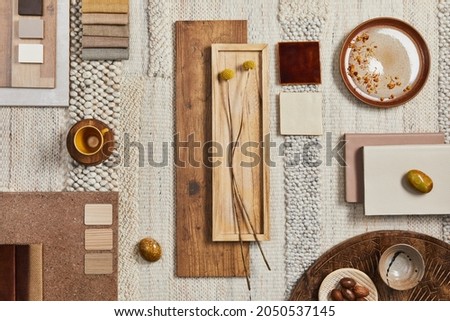 Flat lay design of creative architect moodboard composition with samples of building, beige textile and natural materials and personal accessories. Top view, template.