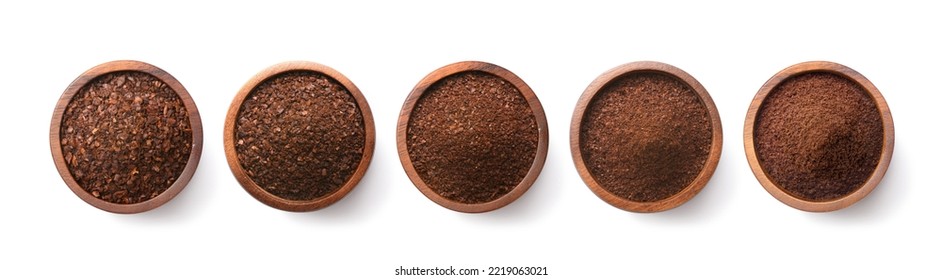 Flat lay of Different types of grinds coffee in wooden bowl isolated on white background. Clipping path. - Shutterstock ID 2219063021