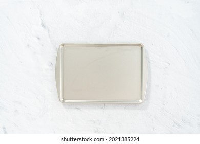 Flat Lay. Empty Baking Sheet On The Kitchen Counter.