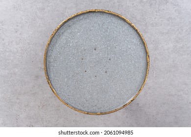 Flat Lay. Empty Large Metal Cake Stand On A Gray Background.