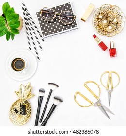 Flat lay for feminine website, blogger, social media. Fashion accessories, cosmetics, coffee and green plant