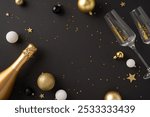 Flat lay of a festive new year celebration setting with a champagne bottle, two glasses, and golden decorations on a dark background