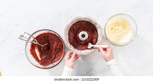 Flat lay. Filling metal bundt cake pan with cake butter to bake red velvet bundt cake with cream cheese glaze