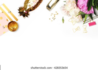Flat lay. Flower on the table.  Gold pineapple, brush pattern and gold polka dots pattern. Table view. Business accessories. Mock-up background. Peonies, glamour style.