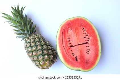 flat lay Fresh cut half red watermelon and pineapple isolated on a white background - Powered by Shutterstock