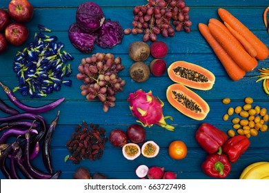Flat lay fresh  fruits and vegetables for background, Different fruits and vegetables for eating healthy, Colorful fruits and vegetables on blue plank background