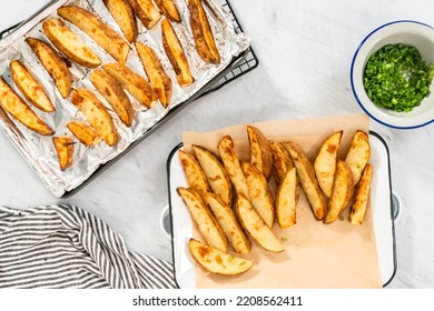 Flat Lay. Freshly Baked Potato Wedges With Spices On A White Serving Tray.