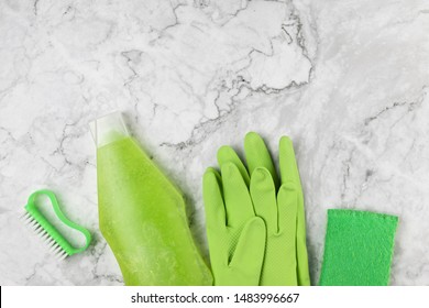 Flat Lay Green Cleaning Products On Marble Background