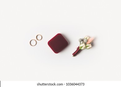 Flat Lay With Grooms Accessories, Buttonhole, Gift And Jewelry Box On Wooden Surface