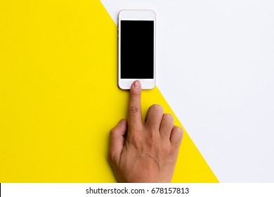 Flat Lay Hand Using Phone Blank Screen On Top View,background In Pastel Colors.clipping Path Inside