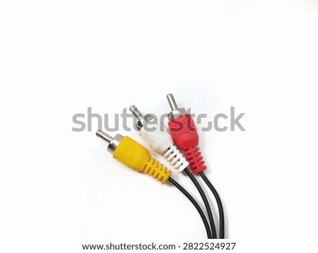 Flat lay of an insulated RCA cable against a white background.