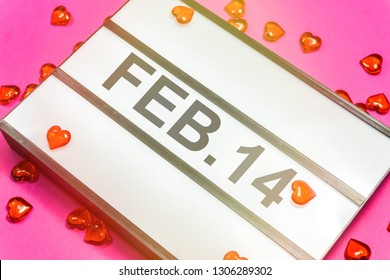 Flat lay of Lightbox on Pink background showing Valentine’s Day date