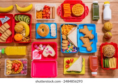 Flat lay Lunch box with various snack, fruit and sweet food on wooden table. Food Photography - Powered by Shutterstock