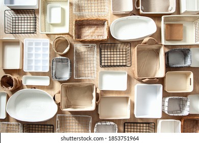 Flat Lay Of Marie Kondo's Storage Boxes, Containers And Baskets With Different Sizes And Shapes For Tidying Up Wardrobe. KonMari Method Organizer Boxes Set. Closet Organizing Concept.