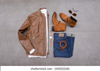 flat lay ,men's fashion, casual outfits with accessories on gray background