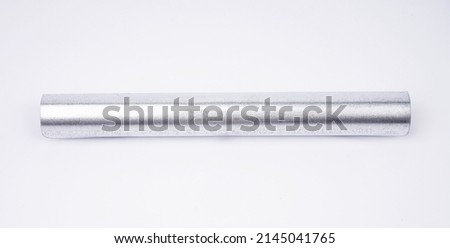 flat lay metal pipe isolated on white.Stainless steel tube pipe isolated background.Straight Ecological stainless steel straw on a white background.Close-up with details.macro shoot,front view      