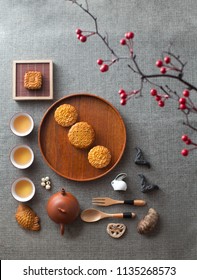 Flat Lay Mid Autumn Festival Moon Cake, Snacks And Tea Still Life.