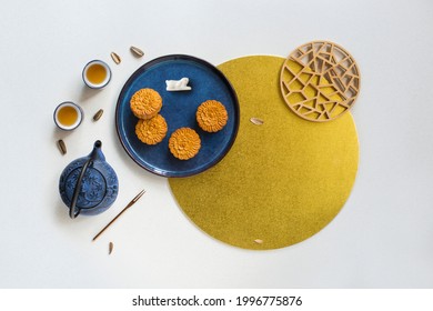 Flat Lay Mid Autumn Festival Mooncake And Tea Still Life On White Textured Background.