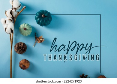 Flat Lay Of Modern Fall Graphic Elements And Happy Thanksgiving Message For Blue Holiday Frame And Greeting.