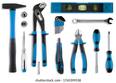 Flat lay with multiple work tools on white background with a soft shadow. - Shutterstock ID 1765399538