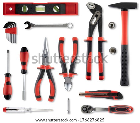 Flat lay with multiple work tools on white background with a soft shadow.