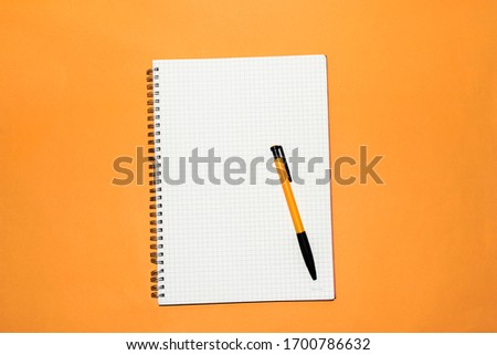 flat lay notepad headphone and pen. free time. free space 