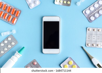 Flat Lay Order, Purchase Of Medicine, Tablets Online Through The Application On Phone, On Blue Background With Copy Space. Mock Up