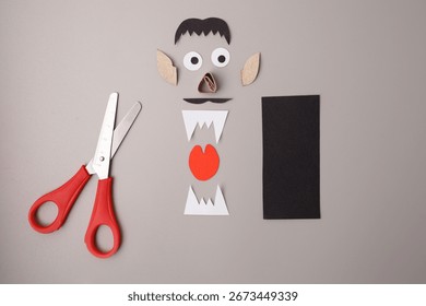 Flat lay of paper face components for creative project, perfect for children education, craft blogs, art lesson plans, and playful product packaging design.