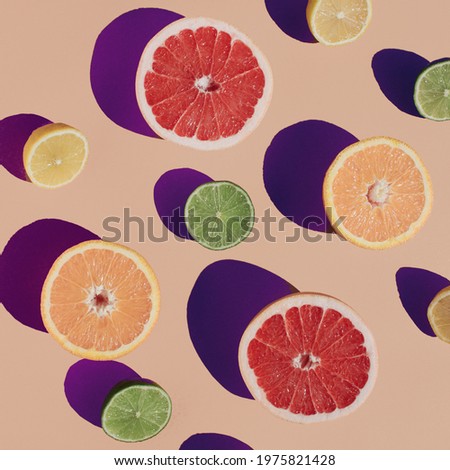 Flat lay pattern with summer citrus fruit. Minimal concept with sharp blue shadows. Trendy social mockup.