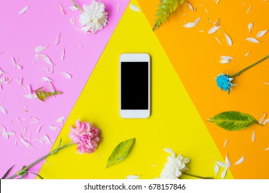 Flat Lay Phone Blank Screen And Flowers On Top View,background In Pastel Colors.clipping Path Inside