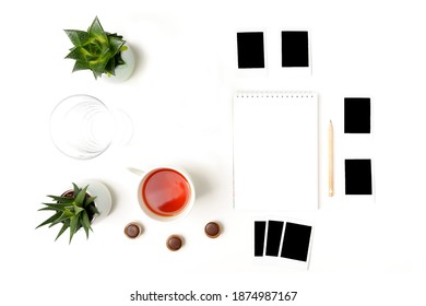 Flat Lay Photos, Paper Notepad And Pencil, Cup Of Tea, Glass Of Water, Succulents On White Background.