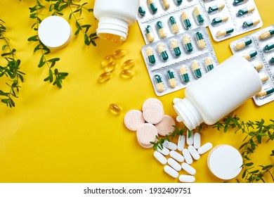 Flat Lay Of Pills, Fish Oil, Vitamins  On Yellow Background, Healthcare Concept, Healthy Food, Supplements For Healthy Good Life, Immune Booster.