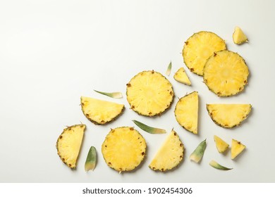 Flat Lay With Pineapple Slices On White Background, Top View