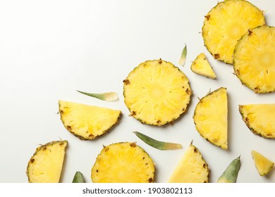 Flat Lay With Pineapple Slices On White Background, Top View