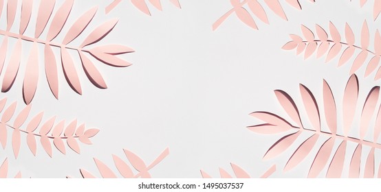 Flat Lay Pink Paper Palm Leaves On Gray Background. Summer Frame Mockup. Copy Space