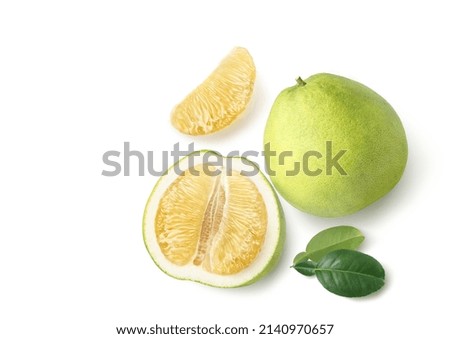 Flat lay of Pomelo fruit with half slices isolated on white background.