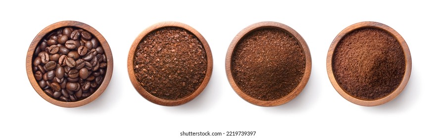 Flat lay of Roasted Coffee beans and different types of grinds coffee in wooden bowl isolated on white background. Clipping path.